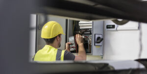 Electrician checking RTU Terminal